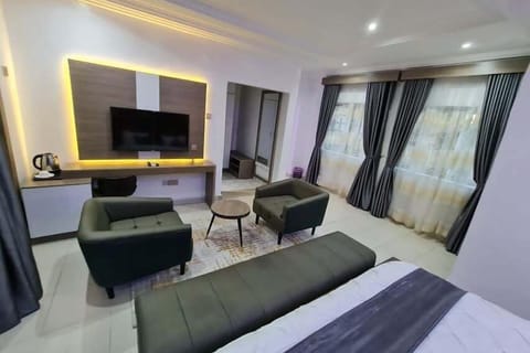 Economy Room, Balcony, City View | Desk, laptop workspace, blackout drapes, soundproofing
