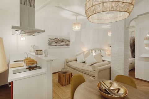 Luxury Apartment, City View | Living area | Flat-screen TV