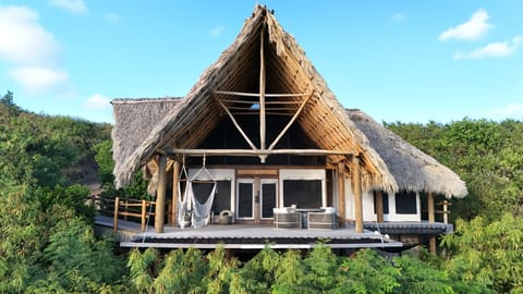 Marvel at the architectural beauty of Abundance, designed to harmonize with its lush surroundings, inviting you to unwind and rejuvenate on your island escape.