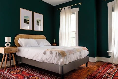Soft linens, layered rugs & blackout shades for deep rest (Queen – Side B)