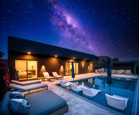 - Experience starry nights from the poolside loungers - Outdoor living blends with serene desert skies and glowing suites - Unwind in a private retreat with stunning nighttime scenery