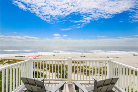 This third floor balcony off of the king suite provides a bird's eye view of the beach and ocean.