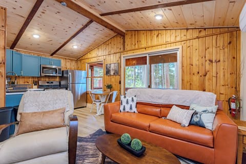 Indulge in comfort and style in our living room, featuring plush sofas, and elegant chairs. Cozy up by the fireplace, and unwind with entertainment on the TV.