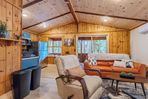 Indulge in comfort and style in our living room, featuring plush sofas, and elegant chairs. Cozy up by the fireplace, and unwind with entertainment on the TV.