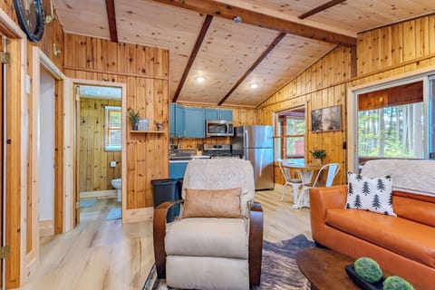 Indulge in comfort and style in our living room, featuring plush sofas, and elegant chairs. Cozy up by the fireplace, and unwind with entertainment on the TV.