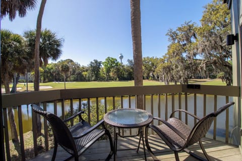 Step onto your private balcony and breathe in the tranquil golf course views. Sip morning coffee at your bistro table while watching peaceful water reflections.