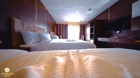 Deluxe Triple Room, City View | In-room safe, soundproofing, free WiFi, wheelchair access
