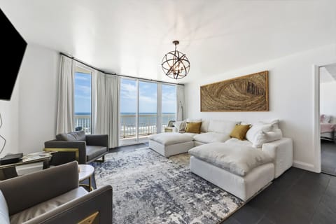 Large cozy couch and seating with stunning ocean views
