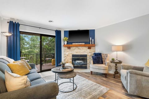 Curl up in the breezy living room & stream your favorites on the smart TV​
