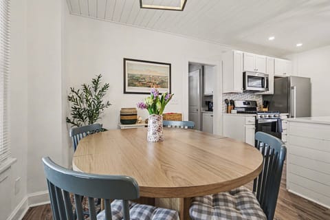 Open dining space flowing into the modern kitchen