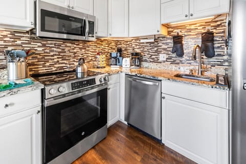Beautiful Fully Equipped Kitchen with Stainless Appliances