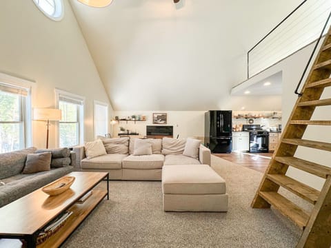 Cozy living room with nature views from every window