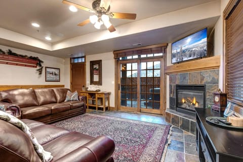 Settle in by the fireplace after a day outdoors in this warm, inviting space. PPS-1416