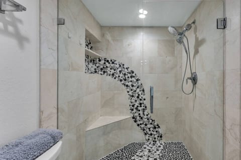 Enjoy spa-like vibes with the walk-in shower in the primary suite!