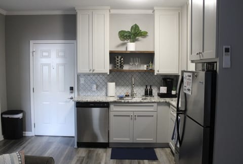 Kitchen Oasis: Sleek countertops and modern appliances await your culinary adventures.