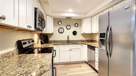 Kitchen - Fully equipped with stainless steel appliances and granite countertops