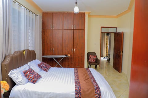 Cozy, Serene and Spacious bedroom with Ironing board, wardrobes for your comfort