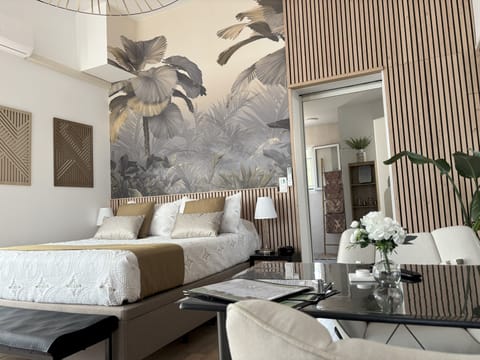 Superior Suite, Pool View | Blackout drapes, soundproofing, iron/ironing board, free WiFi