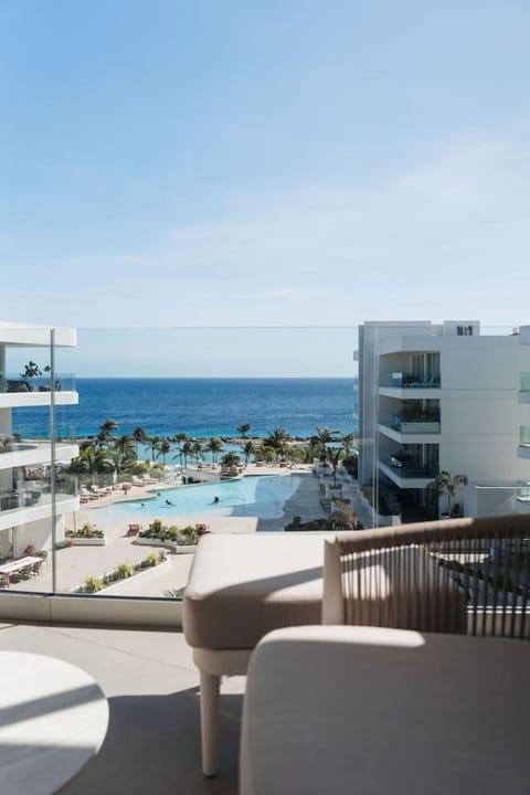 Wake up to paradise! Enjoy breathtaking ocean views from your balcony, where the sound of waves and the sight of the shimmering pool create the perfect backdrop for your getaway.