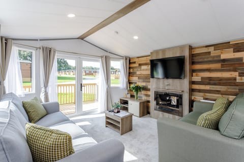 Exc 4 Berth waterside lodge Hot Tub | Living area | 32-inch LCD TV with digital channels