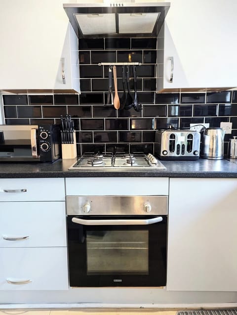 Well-appointed kitchen with modern fittings, plenty of counter space, and all tools for effortless cooking.