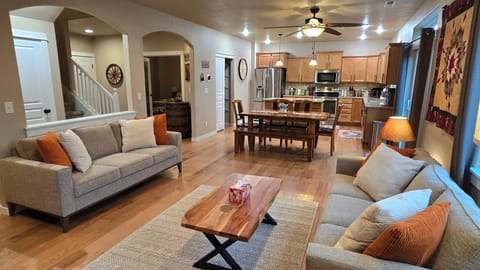 Living room with fireplace and 55" HD TV