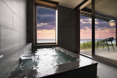 Luxury Suite, Terrace, Ocean View | Bathroom | Separate tub and shower, free toiletries, hair dryer, slippers