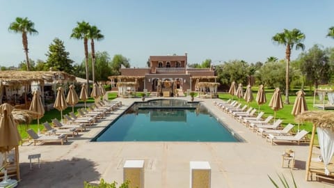 2 outdoor pools, pool umbrellas, sun loungers