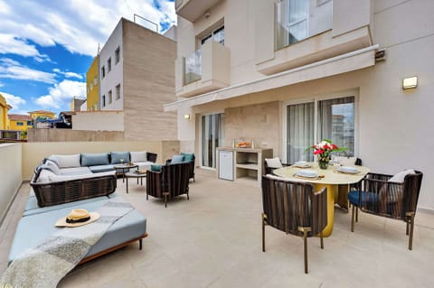 Designer Outdoor Lounge with Dining & Daybeds — Entertain in Style on Your Private Sun-Drenched Terrace in Playa San Juan
