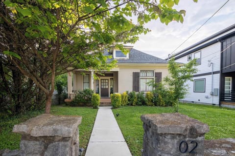 Step into Nashville's charm with a lovely porch and lush greenery!
