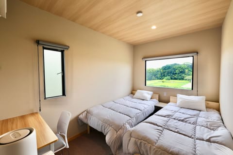 Standard Twin Room, 2 Bedrooms | Desk, laptop workspace, blackout drapes, soundproofing
