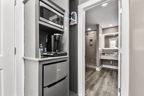 Designer toiletries, hair dryer, towels, soap