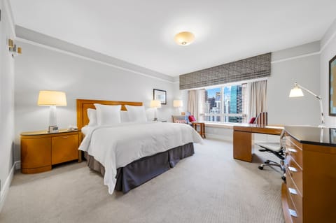 Superior Suite, Partial Ocean View | In-room safe, desk, laptop workspace, free WiFi