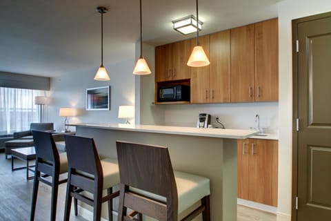 Suite, 1 Bedroom (1 King, Living Area) | 1 bedroom, in-room safe, desk, iron/ironing board