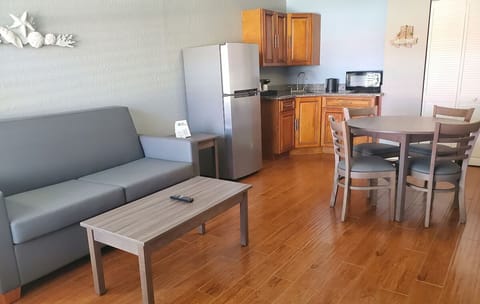 Unwind on the sofa after meals in your kitchenette.