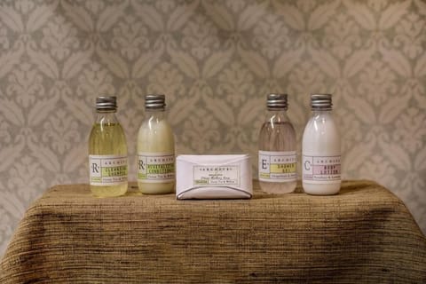 Indulge in premium bath amenities for a spa-like reset.