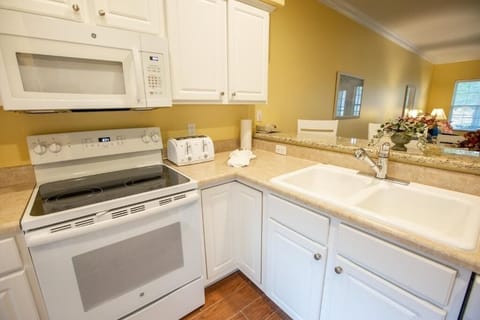 Cook easy breakfasts with full stove, microwave, and roomy counters.