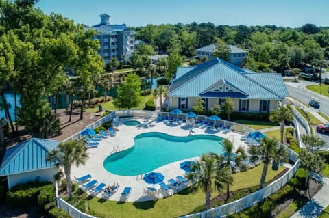 Admire the resort grounds from an elevated poolside view.