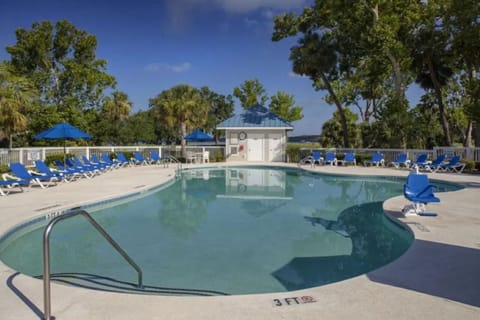 Soak up sunshine beside the sparkling pool and loungers.