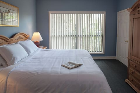 Wake gently to daylight filtering through wide bedroom windows.