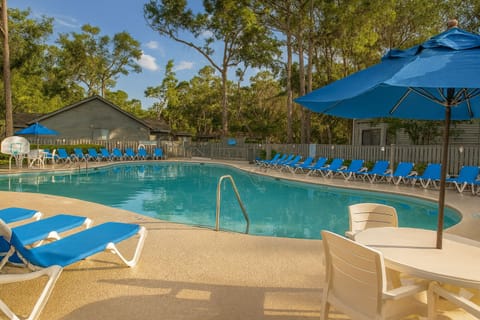 Gather poolside with friends for relaxed, sunlit afternoons.