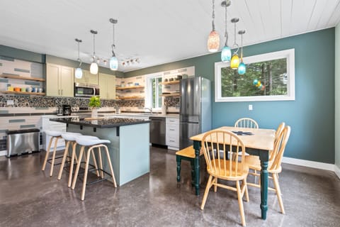 Modern stylings throughout kitchen and dining room