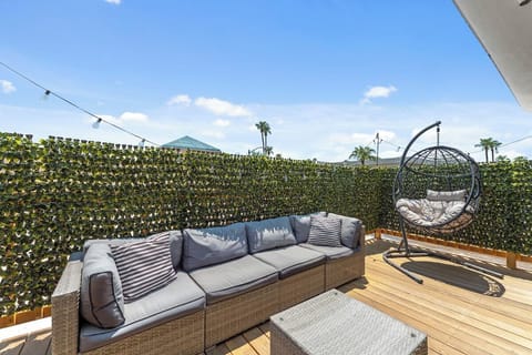 Sunny Patio Deck w/ Swing Chair & Greenery