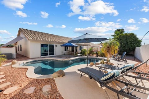 Immerse yourself in vacation bliss at our pool area.
