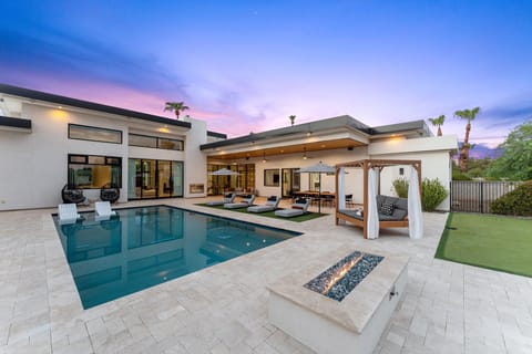 Scottsdale Modern Villa, a high-end home with a resort-like backyard with pool, hot tub, firepit, & loungers