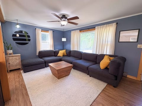 Living room couch can be rearranged into bed shape