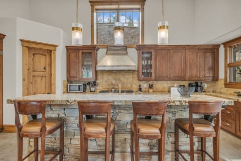 Kitchen: Main floor, Viking range, drip coffee maker, Keurig, toaster, utensils, tableware