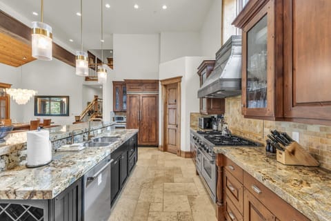 Kitchen: Main floor, Viking range, drip coffee maker, Keurig, toaster, utensils, tableware