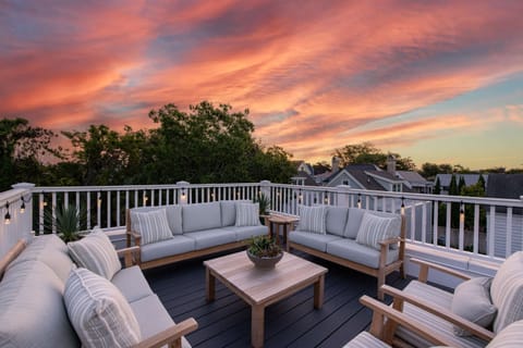 Private rooftop lounge with sunset views — exclusive to Suite B.