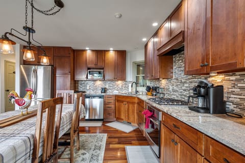 Gas stove, Keurig and drip coffee makers and upscale appliances. 